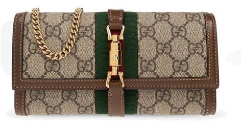 brown leather gucci wallet womans|Gucci jackie 1961 chain wallet.